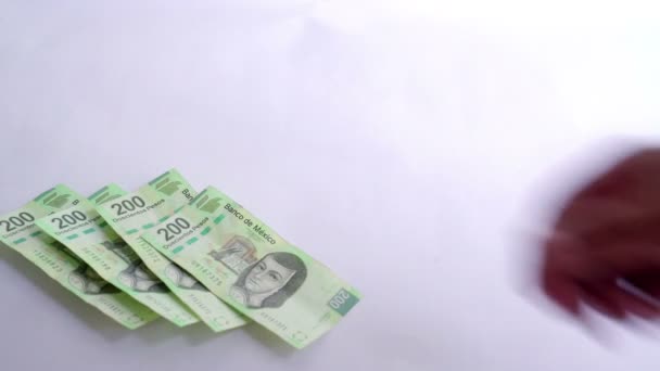 Monte Notas Peso Mexicano 200 São Acomodados Por Uma Mão — Vídeo de Stock