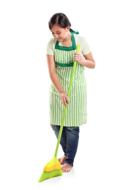 Cleaning lady at work, sweeping the floor. Studio background, full body portrait clipart