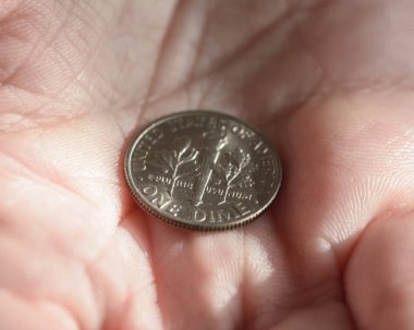 Tek bir Amerikan kuruş bile alan makro fotoğrafçılık için sığ derinliği bir eller A avuç