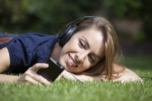 Beautiful Happy Young Woman Headphones Listening Music Lying Grass — Stock Photo, Image