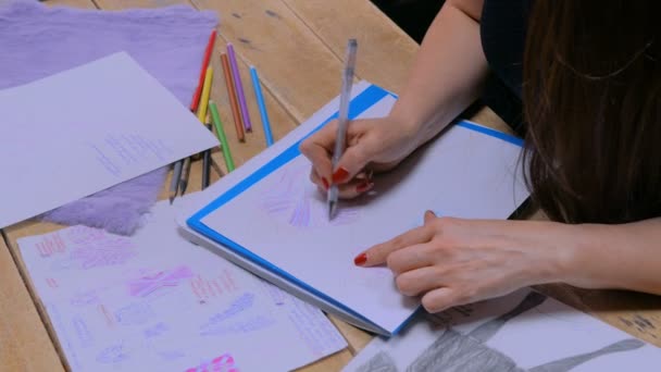 Fashion designer drawing design sketch — Stock Video