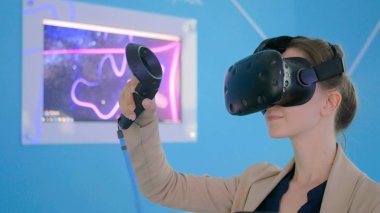 Young woman using virtual reality headset and drawing clipart