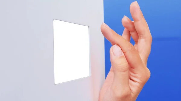 Woman hand using white empty display