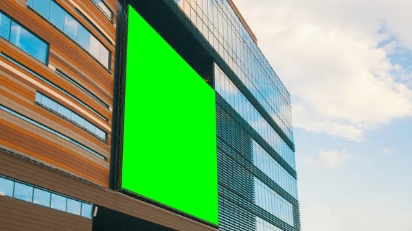 Green screen billboard on shopping mall