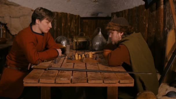 Two men playing popular strategy board game - tafl — Stock Video