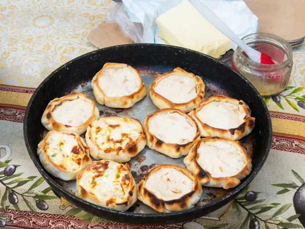 Process of cooking hot pies with chicken and cheese