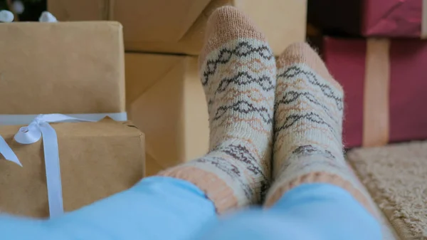 Woman feet in warm socks