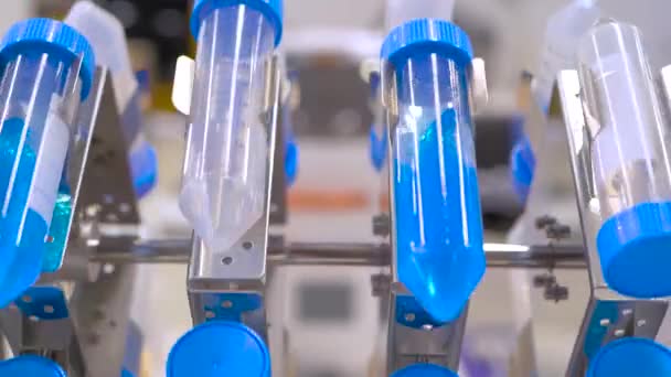 Digital tube rotisserie rotator for effective mixing biological liquid: close up — Stock Video