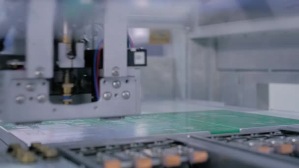Automatic SMD pick and place machine assembling computer printed circuit board — Stock Video