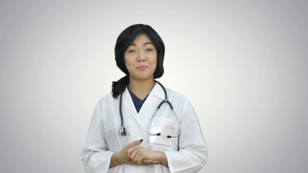 Positive Chinese Doctor Talking Camera White Background Close Professional Shot — Stockvideo