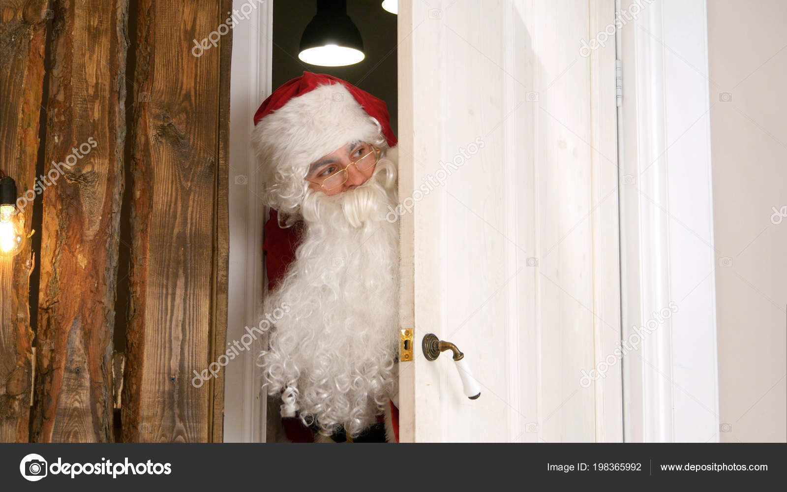 Sneaking Santa Claus Secretly Entering The Living Room