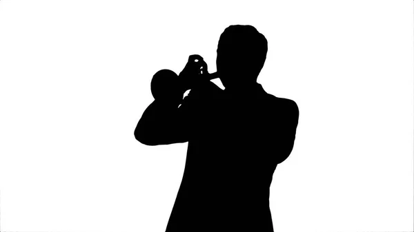 Silhouette Joven músico tocando la trompeta — Foto de Stock
