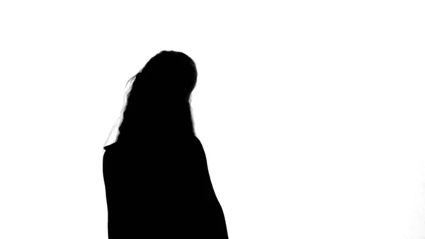 Silhouette Happy beautiful little girl posing to a camera track matte — Stock Photo, Image