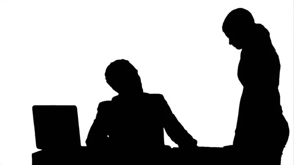 Silhouette Angry boss with female worker in office — Stock Photo, Image