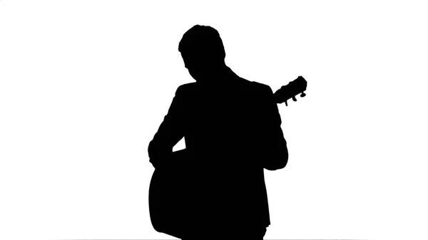 Silhouette Joven tocando la guitarra — Foto de Stock