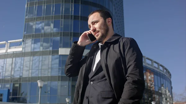 Businessman calling on mobile phone