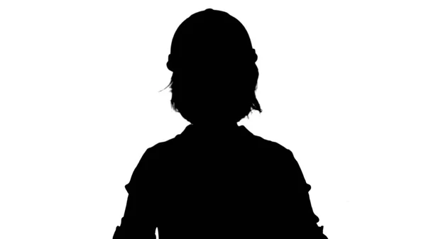 Silhouette Female engineer standing and talking to a camera track matte — Stock Photo, Image