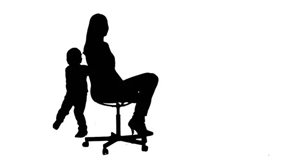 Silhouette schönes Porträt einer Mutter und eines Sohnes — Stockfoto