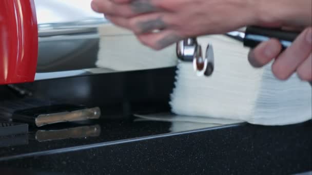 Barista presses ground coffee using tamper — Stock Video