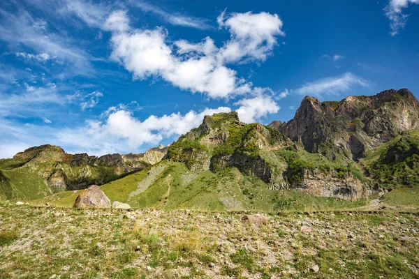 stock image summer mountains green grass and blue sky landscape