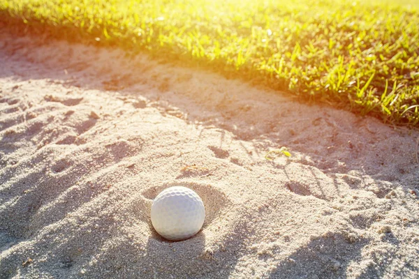 Selective Focus White Golf Ball Green Field Sand Bunker Sunlight — Stock Photo, Image