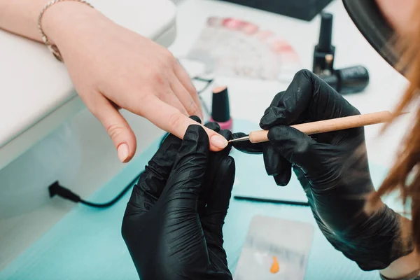 stock image Manicurist at work, beaty manicure nails. Manicure process. Closeup photo shoot of manicure process at beaty studio.