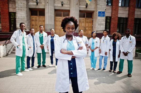 Group of african doctors students near medical university outdoor.