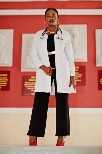 African american doctor student female at lab coat with stethoscope inside medical university.