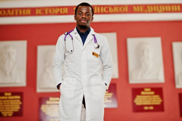 African american doctor student male at lab coat with stethoscope inside medical university.