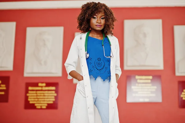 African american doctor student female at lab coat with stethoscope inside medical university.
