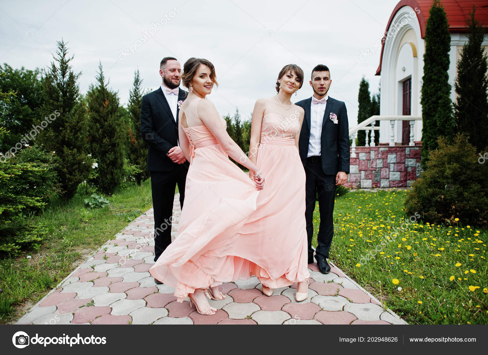 Groomsmen Bridesmaids Posing Outdoors Next Church Stock Photo