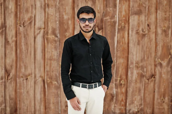 Casual Young Indian Man Black Shirt Sunglasses Posed Wooden Background — Stock Photo, Image