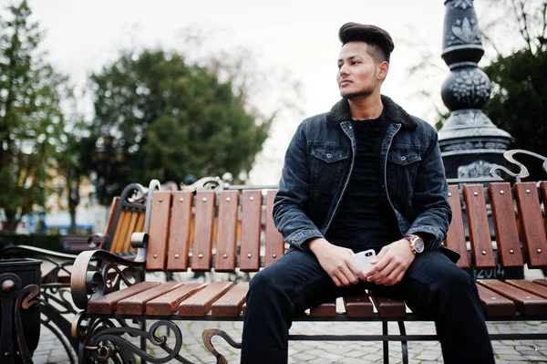 Handsome Fashionable Indian Man Black Jeans Jacket Posed Outdoor Sitting — Stock Photo, Image