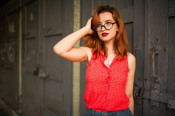 Attractive Redhaired Woman Eyeglasses Wear Red Blouse Jeans Skirt Posing — Stock Photo, Image