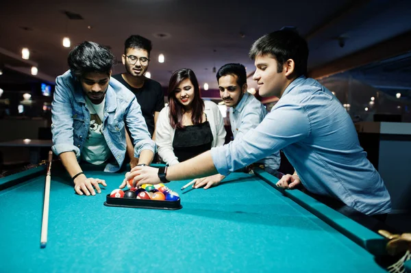 Group of stylish asian friends wear on jeans playing pool billia — Stock Photo, Image