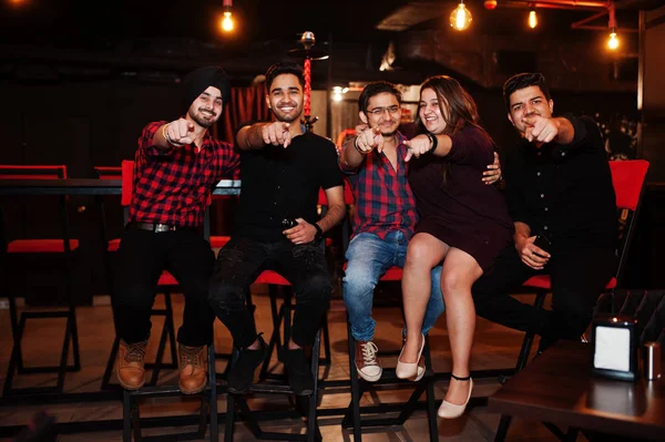 Group of indian friends sitting at lounge bar, having fun and re — Stock Photo, Image