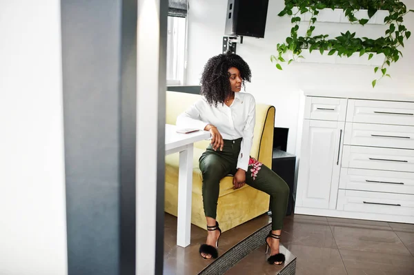 ��heerful business african american lady with afro hair, wear wh