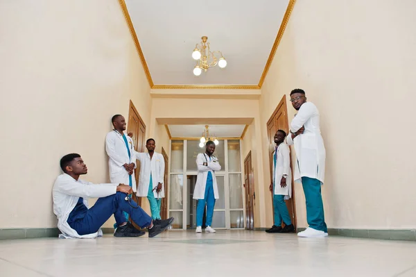 Group of african male medical students in college.