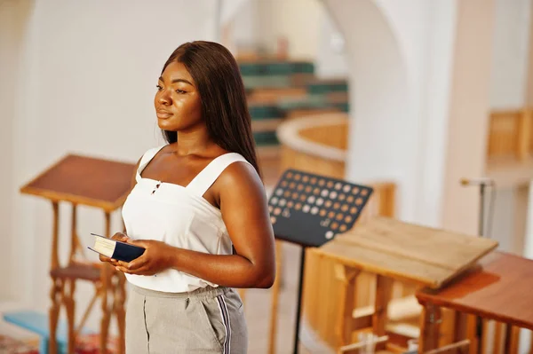 African american woman praying in the church. Believers meditate