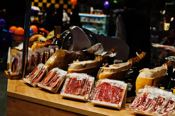 Traditional spanish jamon ham for sale at supermarket. — Stock Photo, Image