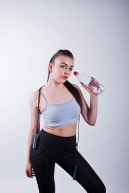 Üst ve siyah legging neşeli çekici genç Fitness kadın