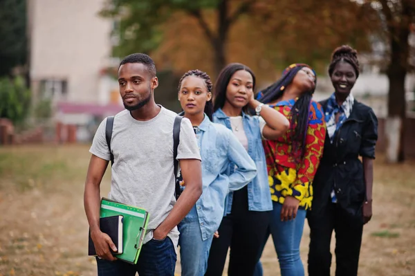 Row of group five african college students spending time togethe — Stock Photo, Image