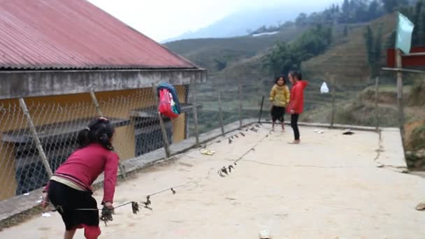 Sapa, Vietnam - December 01, 2016 : Ethnic minority children at school.The building serves as a kindergarten for children from nearby villages. — Stock Video