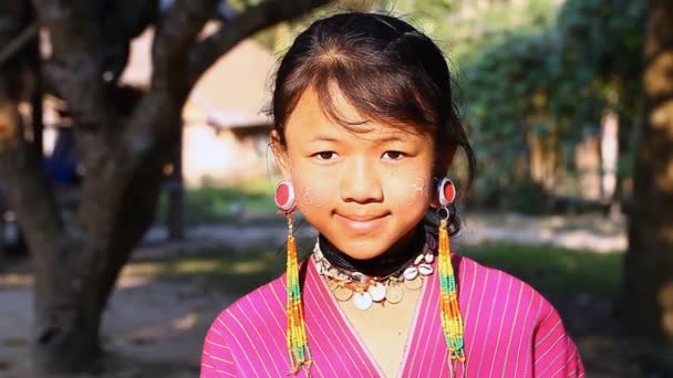 Chiang Mai,Thailand-February 13 ,2017:Video portrait of a young girl from the hill tribe Kayaw living in Eco-Agricultural Hill Tribes Village - Baan Tong Luang.They are a subgroup of Karen tribe. — Stock Video