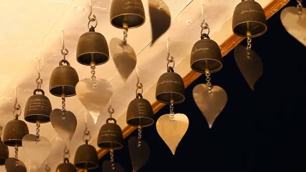 Buddhism. Buddhist bells in the temple. Sacred symbol. Traditional Buddhist praying bells — Stock Video