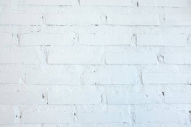 Kırsal odada beyaz tuğla duvar arkaplanı.