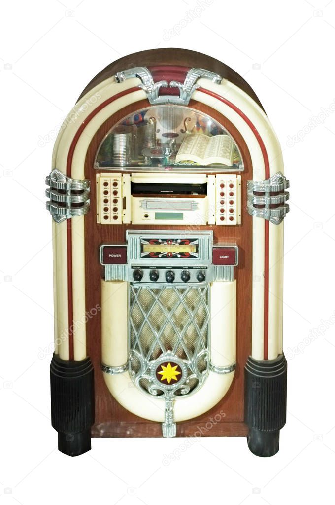 Old jukebox music player isolated on white background . Concept music