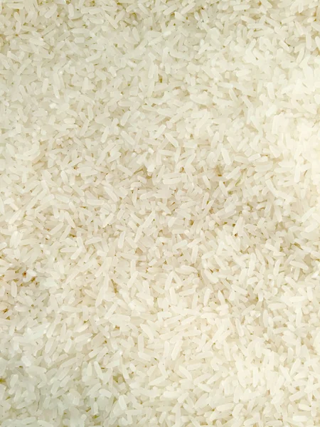 Textura de arroz de cerca. Fondo y textura del arroz natural . — Foto de Stock