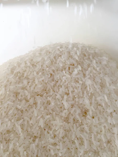 Textura de arroz de cerca. Fondo y textura del arroz natural . —  Fotos de Stock