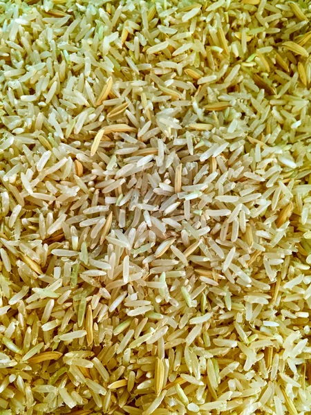 Rizs textúra közelről. Természetes rizsháttér és textúra. — Stock Fotó